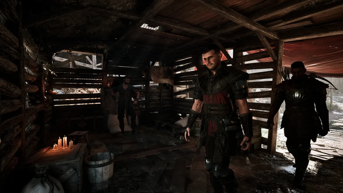Official Gothic 1 Remake screenshot of traders and guards inside the Old Camp